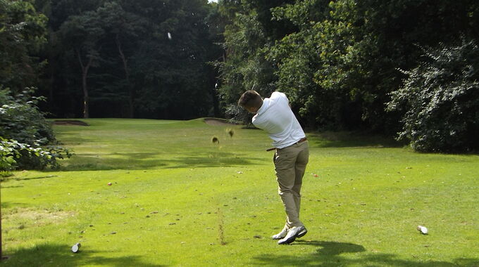 Jack Brown tees off at the short 9th hole at Royal Norwich